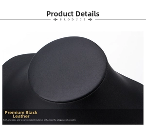 Close-up of black lychee grain faux leather texture on a jewelry necklace display stand