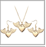 Detailed set of gold heart and angel wing necklace with matching earrings on white base