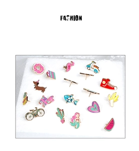 Selection of colorful enamel badges featuring cartoon donut, unicorn and cactus pins