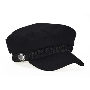 Detail of black wool newsboy hat featuring a braided rope and silver crown button