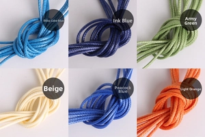 Macro detail of 2mm braided wax cords for DIY jewelry in six assorted vivid colors