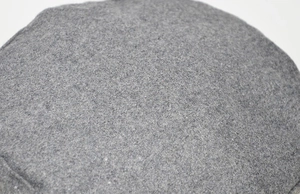 Close-up of the grey wool felt texture and stitching on this vintage newsboy cap