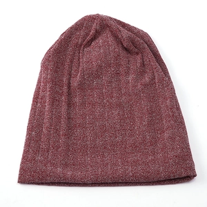 Sparkling dark red knitted beanie with silver glitter lines for windproof winter warmth