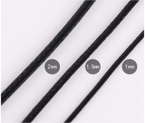 Detail of 1mm, 1.5mm, and 2mm black waxed cord texture for DIY necklace and bracelet making