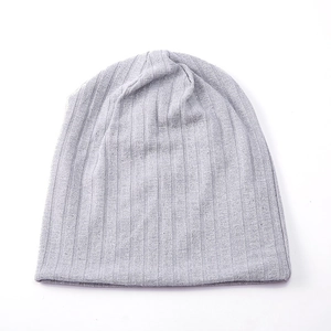 Detailed view of light gray ribbed knit beanie texture for winter warmth