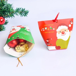 Christmas gift boxes with red and green themes featuring Santa Claus and ribbons