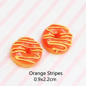 Realistic orange resin donut DIY charm accessory with yellow lines and glossy finish