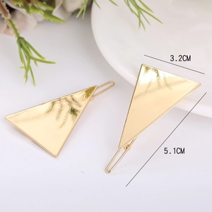 Pair of gold geometric triangle hair clips with hammered metal texture, 5.1cm length