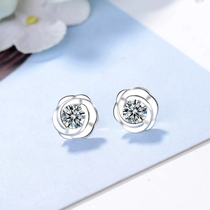 Elegant rose flower stud earrings in silver finish with sparkling cubic zirconia center