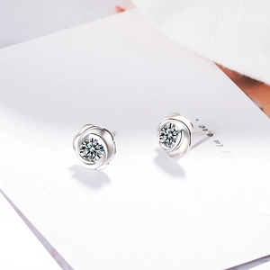 Elegant silver camellia flower stud earrings with sparkling white zircon stones