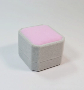 Premium gray velvet ring box with soft pink interior and octagonal square design