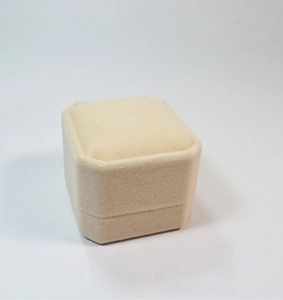 Beige velvet jewelry box with octagonal top design for single ring and stud storage