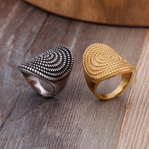 Vintage stainless steel ring set with unique spiral fingerprint texture in silver and gold