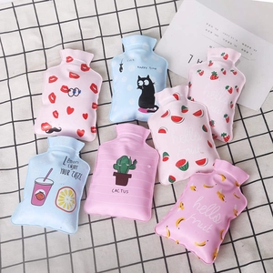 Mini PVC hot water bottles set with cute fruit and animal patterns on grid background