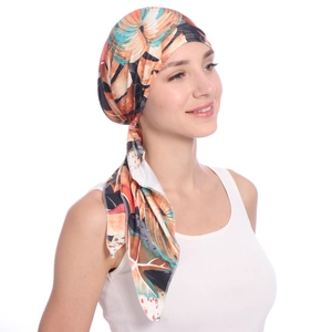 Detail of tropical floral print on stretch milk silk headwrap turban for women