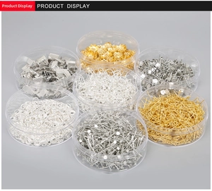 Macro display of gold and silver DIY jewelry finding kits in transparent round cases