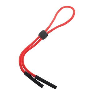 Detail of red braided sports eyewear lanyard with adjustable black slider and end caps