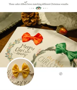 Three-color satin bows in red green and gold for DIY Christmas greeting card decoration