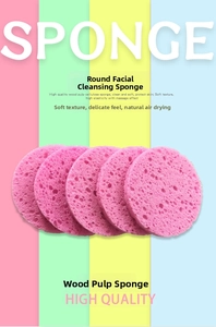 Close-up of 5-piece round pink wood pulp cellulose sponges for face cleansing and massage