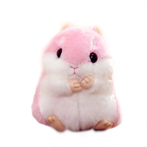 Cute pink and white plush hamster keychain charm sitting on a clean white background