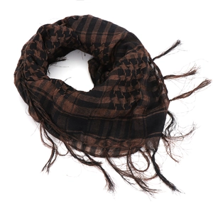 Close-up of brown and black shemagh tactical scarf with detailed woven texture and fringe