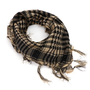 Detail of checkered shemagh scarf with fringes for outdoor and tactical use