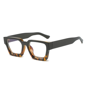 Retro thick rectangular eyewear with black and tortoiseshell finish on white background