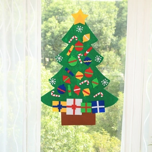 DIY felt Christmas tree set with colorful ornaments and star topper on glass window