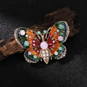 Vintage gold-plated butterfly brooch with colorful enamel and multi-gemstone inlay