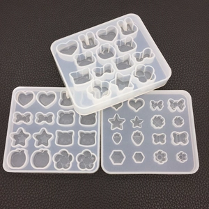Detail view of semi-transparent silicone mold sets with heart, star and rabbit shapes