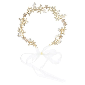 Close-up of golden leaf bridal headband with rhinestones and white organza ribbon