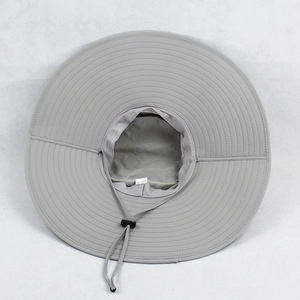 Detailed top view of light grey sun hat featuring quick-dry fabric and mesh lining