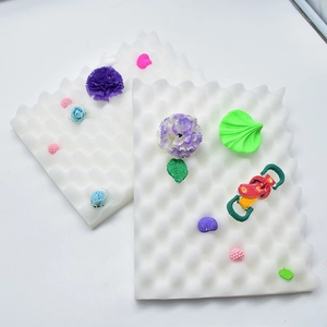 Detail of 5 and 12 holes foam pads for drying fondant flowers and sugarcraft modeling