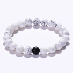 Minimalist 8mm white turquoise beaded bracelet with single matte black accent stone