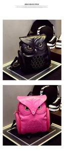 Vertical view of black and magenta owl-shaped backpacks with detailed feather stitching