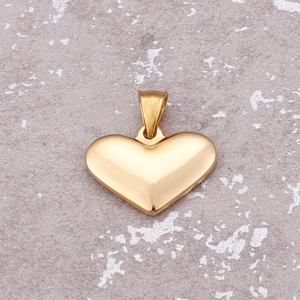 Polished gold heart pendant necklace for women featuring a smooth minimalist surface