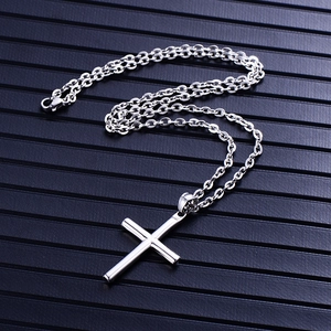 Polished silver stainless steel cylinder cross pendant with O-link chain necklace detail