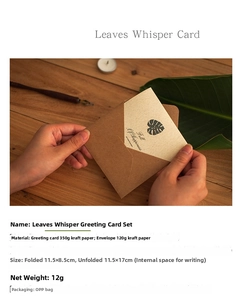 Close-up of hands opening a vintage kraft greeting card set with envelope and sticker