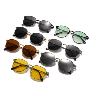 Collection of retro metal oval sunglasses in various lens colors with engraved spring hinges