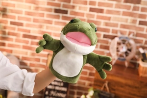 Green plush frog hand puppet for storytelling and interactive play in a home setting