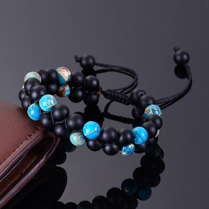 Double-layered adjustable black lava rock and turquoise bead braided bracelet
