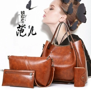 Detailed set of brown crocodile pattern tote, crossbody bag and matching wallets