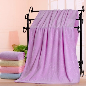 Detail showing embossed bear and heart patterns on soft microfiber absorbent bath towel