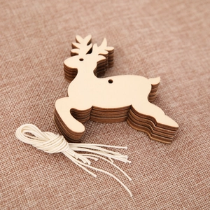 Christmas wooden reindeer hanging ornaments with laser cut details and cotton rope
