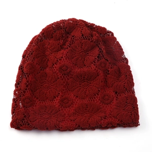 Elegant wine red hollow out floral lace knitted beanie hat with breathable crochet pattern
