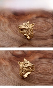 Detailed side view of golden wolf head ring made of 18K gold-plated stainless steel