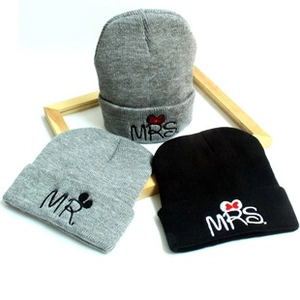 Detail showing Mr. and Mrs. embroidered winter knit beanies with cartoon ear accents