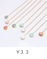 Multiple teardrop natural stone crystal necklaces with golden chains on white background