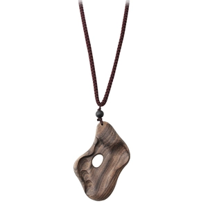 Ethnic vintage long sweater necklace with irregular dark brown wood pendant and woven rope