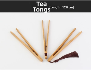 Detailed view of 17.8cm straight bamboo tea tongs with natural wood grain and tassel